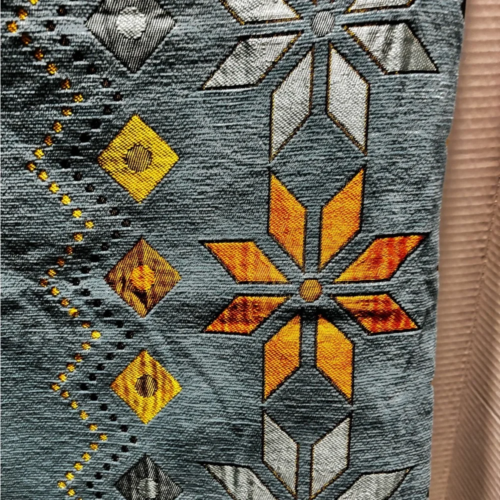 Geometric Patterned Textile with Yellow and Orange Accents Couch cover
